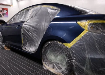 Car preparation for painting – vehicle in California-fully masked with tape and protective film at Azimov Collision