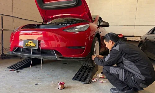Tesla suspension and wheel repair by professional mechanic in California at Azimov Collision